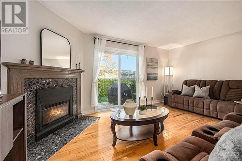 62 Clarkson Crescent, Kanata, ON - Indoor Photo Showing Living Room With Fireplace