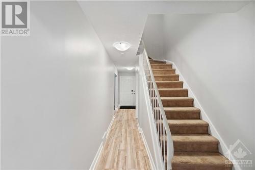 Hallway to kitchen/backyard and staircase upstairs - 3310 Southgate Drive Unit#245, Ottawa, ON - Indoor Photo Showing Other Room