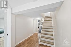 Staircase/hallway to rec room, bath,storage/laundy - 