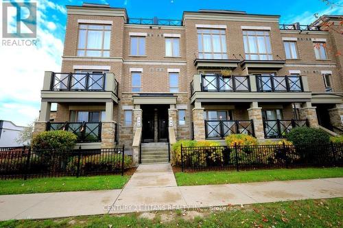 720 - 60 Dunsheath Way, Markham, ON - Outdoor With Deck Patio Veranda With Facade