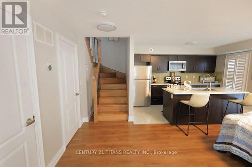 720 - 60 Dunsheath Way, Markham, ON - Indoor Photo Showing Kitchen With Stainless Steel Kitchen With Upgraded Kitchen