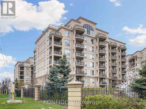 702 - 8 Maison Parc Court, Vaughan, ON - Outdoor With Balcony With Facade