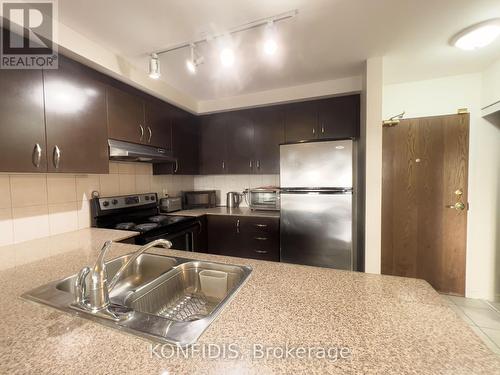 702 - 8 Maison Parc Court, Vaughan, ON - Indoor Photo Showing Kitchen With Stainless Steel Kitchen With Double Sink