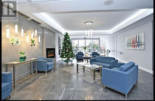 609 - 20 Harding Boulevard, Richmond Hill, ON - Indoor Photo Showing Living Room With Fireplace