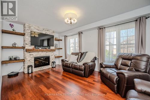 47 Vanhorne Close, Brampton, ON - Indoor Photo Showing Living Room With Fireplace