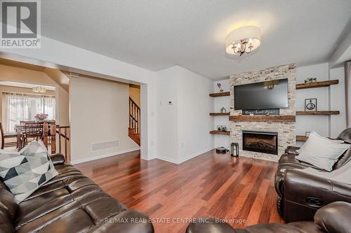 47 Vanhorne Close, Brampton, ON - Indoor Photo Showing Living Room With Fireplace