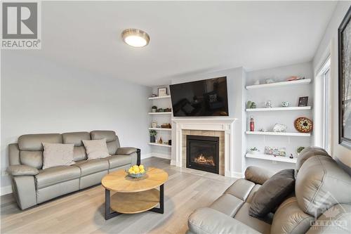 223 Station Trail, Russell, ON - Indoor Photo Showing Living Room With Fireplace