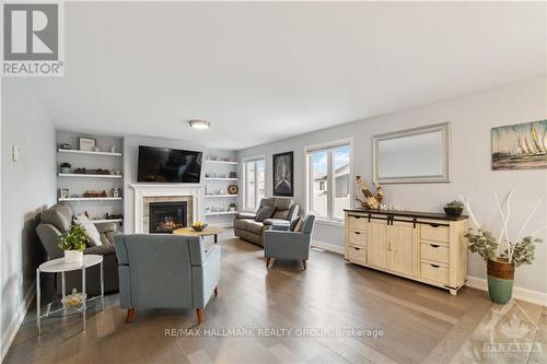 223 Station Trail, Prescott And Russell, ON - Indoor Photo Showing Living Room With Fireplace