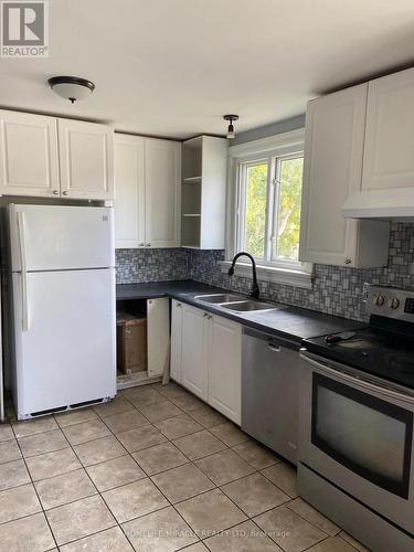 91 Wellington Street W, Barrie, ON - Indoor Photo Showing Kitchen With Double Sink