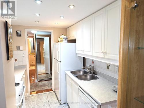 2318 - 1333 Bloor Street E, Mississauga, ON - Indoor Photo Showing Kitchen With Double Sink