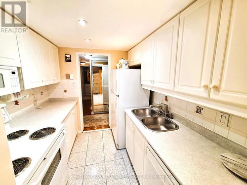 2318 - 1333 Bloor Street E, Mississauga, ON - Indoor Photo Showing Kitchen With Double Sink