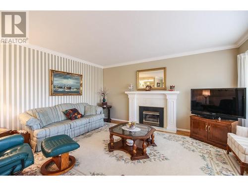 16 Yucca Place, Osoyoos, BC - Indoor Photo Showing Living Room With Fireplace