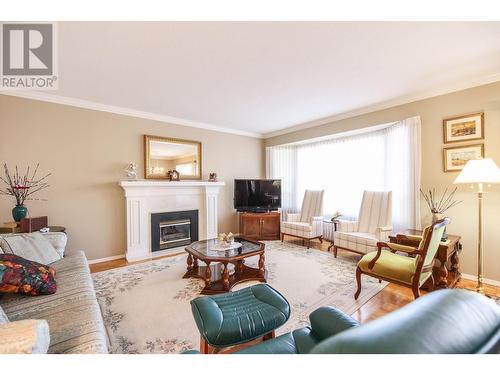 16 Yucca Place, Osoyoos, BC - Indoor Photo Showing Living Room With Fireplace