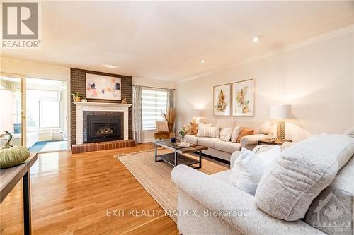 21 Glen Abbey Crescent, Ottawa, ON - Indoor Photo Showing Living Room With Fireplace