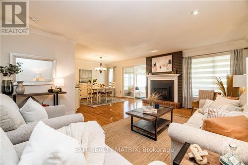 21 Glen Abbey Crescent, Ottawa, ON - Indoor Photo Showing Living Room With Fireplace