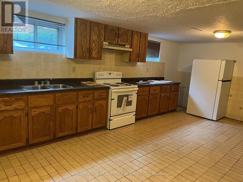 Bsmt - 214 Dixon Road, Toronto, ON - Indoor Photo Showing Kitchen With Double Sink