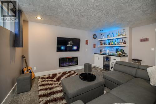 3900 Barnes Drive, Prince George, BC - Indoor Photo Showing Living Room With Fireplace