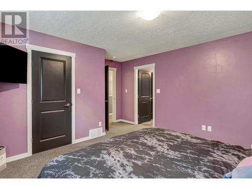 102 7400 Creekside Way, Prince George, BC - Indoor Photo Showing Bedroom