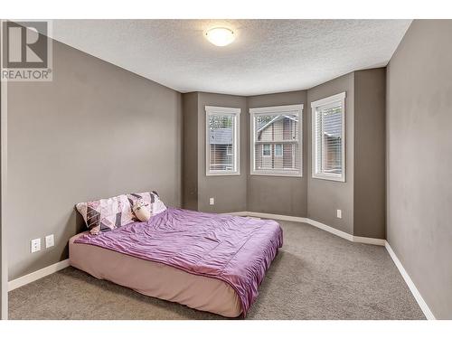 102 7400 Creekside Way, Prince George, BC - Indoor Photo Showing Bedroom