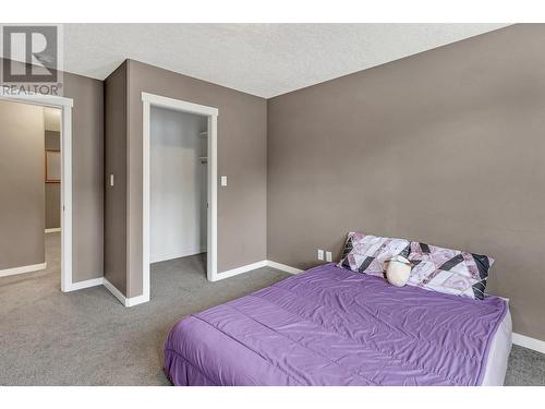 102 7400 Creekside Way, Prince George, BC - Indoor Photo Showing Bedroom