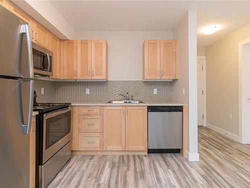 608-917 Avrill Rd, Langford, BC - Indoor Photo Showing Kitchen With Double Sink