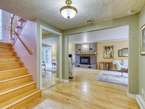 Escalier - 139 Boul. De L'Assomption, Repentigny (Repentigny), QC - Indoor Photo Showing Other Room With Fireplace