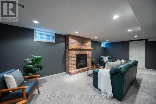 69 Foxhunt Trail, Clarington (Courtice), ON - Indoor Photo Showing Basement With Fireplace