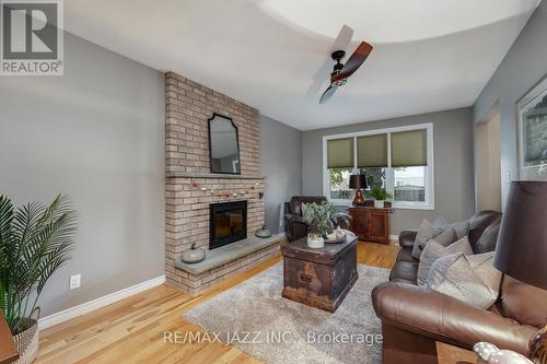 69 Foxhunt Trail, Clarington (Courtice), ON - Indoor Photo Showing Living Room With Fireplace