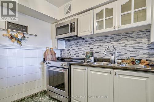 918 - 1485 Lakeshore Road E, Mississauga, ON - Indoor Photo Showing Kitchen With Double Sink