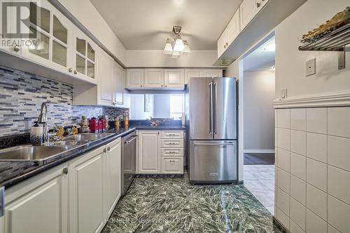 918 - 1485 Lakeshore Road E, Mississauga, ON - Indoor Photo Showing Kitchen With Stainless Steel Kitchen With Double Sink