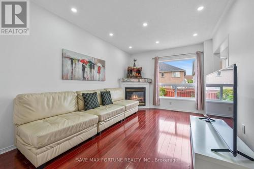 29 Binder Twine Trail, Brampton, ON - Indoor Photo Showing Living Room With Fireplace