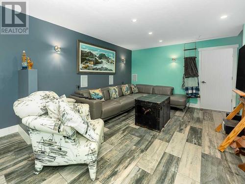 344 Quarry Park Boulevard Se, Calgary, AB - Indoor Photo Showing Living Room