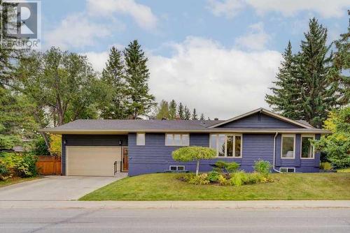 72 Canova Road Sw, Calgary, AB - Outdoor With Facade