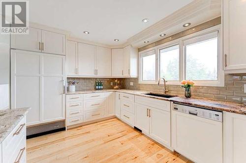 72 Canova Road Sw, Calgary, AB - Indoor Photo Showing Kitchen