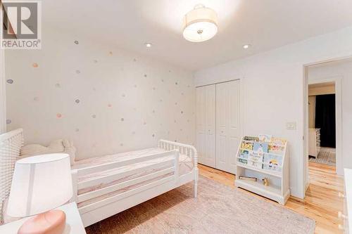 72 Canova Road Sw, Calgary, AB - Indoor Photo Showing Bedroom