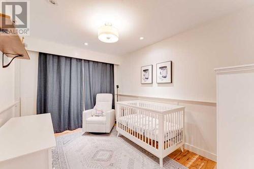 72 Canova Road Sw, Calgary, AB - Indoor Photo Showing Bedroom