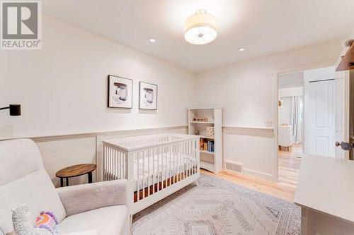 72 Canova Road Sw, Calgary, AB - Indoor Photo Showing Bedroom