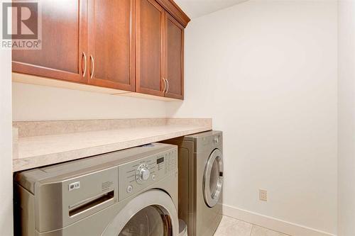 72 Canova Road Sw, Calgary, AB - Indoor Photo Showing Laundry Room