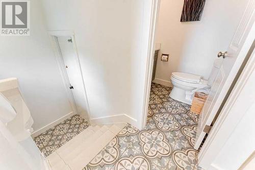 72 Canova Road Sw, Calgary, AB - Indoor Photo Showing Bathroom