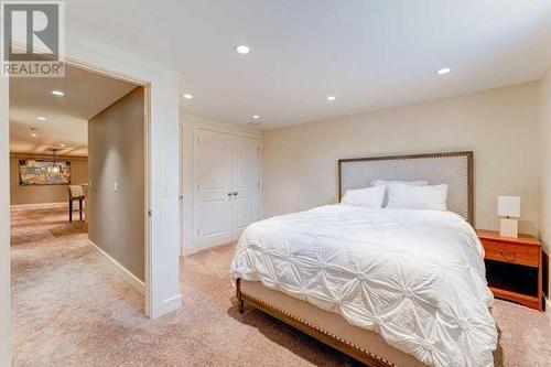 72 Canova Road Sw, Calgary, AB - Indoor Photo Showing Bedroom