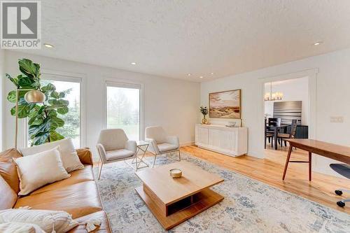 72 Canova Road Sw, Calgary, AB - Indoor Photo Showing Living Room