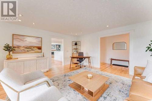 72 Canova Road Sw, Calgary, AB - Indoor Photo Showing Living Room