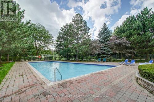 1120 - 138 Bonis Avenue, Toronto, ON - Outdoor With In Ground Pool