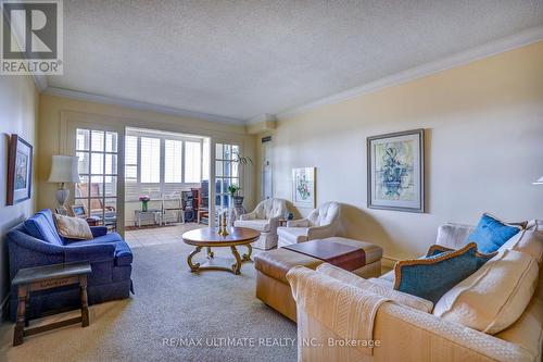 1120 - 138 Bonis Avenue, Toronto, ON - Indoor Photo Showing Living Room