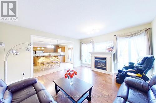 448 Cottontail Crescent, London, ON - Indoor Photo Showing Living Room With Fireplace