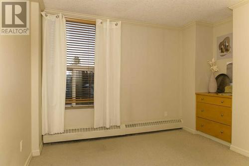 Bedroom - 308, 4603 Varsity Drive Nw, Calgary, AB - Indoor Photo Showing Other Room