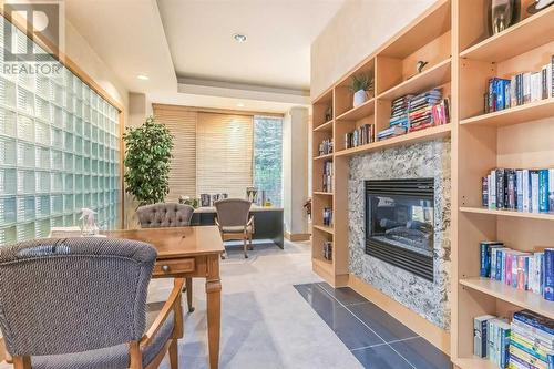 Library - 308, 4603 Varsity Drive Nw, Calgary, AB - Indoor Photo Showing Office With Fireplace