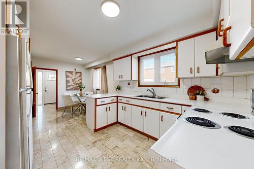 42 Swordbill Drive, Toronto, ON - Indoor Photo Showing Kitchen With Double Sink