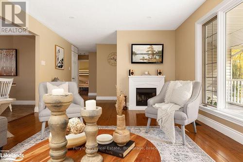 80 Stephenson Rd 7 E, Huntsville (Stephenson), ON - Indoor Photo Showing Living Room With Fireplace