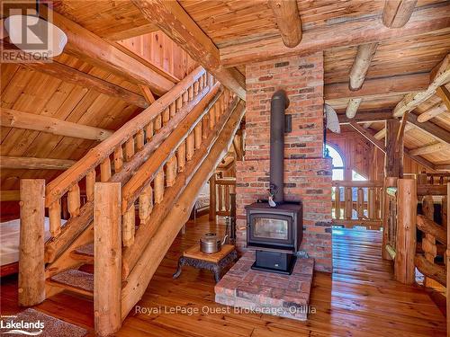 1400 Chemin Du Loup Road, Tiny, ON - Indoor Photo Showing Other Room With Fireplace